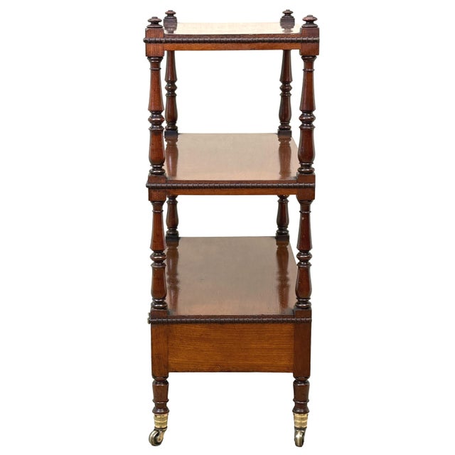A superb quality early 19th-century Regency period mahogany small whatnot, or étagère, of rare wide proportions, the three...