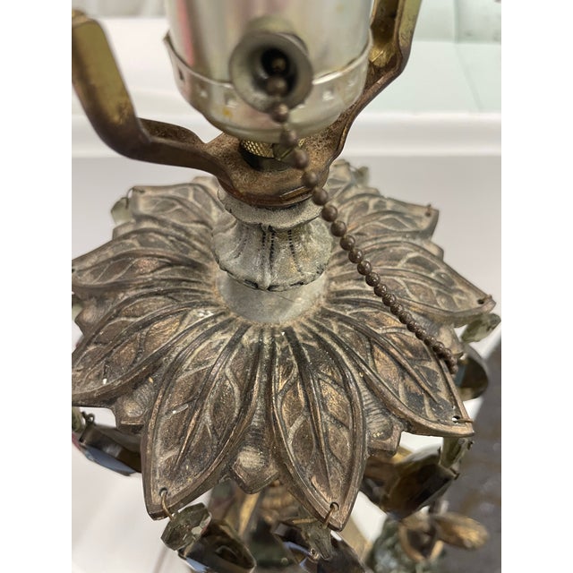 Stunning vintage table lamp with exquisite details in a very Hollywood/Rococo style or some may even say Gothic. It...