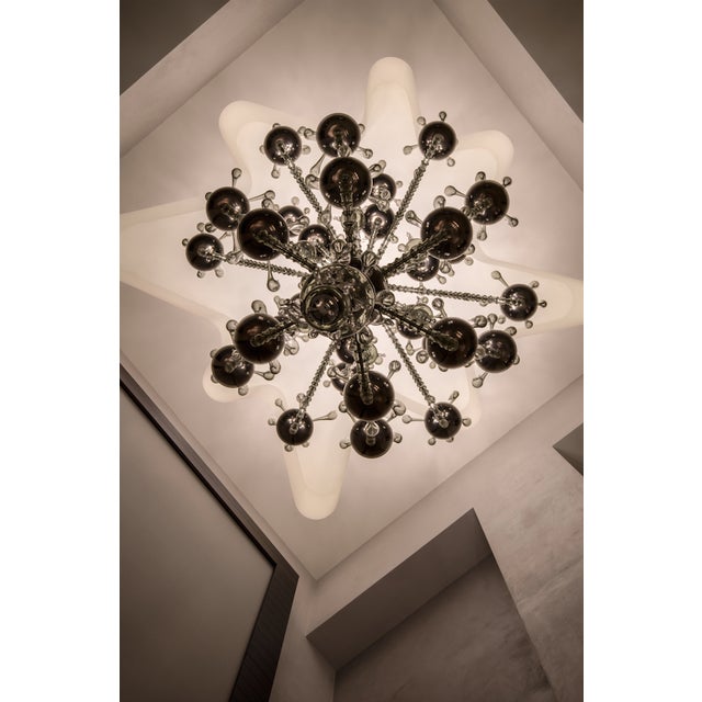 This wonderful chandelier was commissioned by a young couple from Dubai to furnish the entrance of a wonderful villa to...