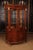 High-quality Cuba mahogany on solid softwood. Architecturally articulated body. Two-door, bent frame box on pressed,...
