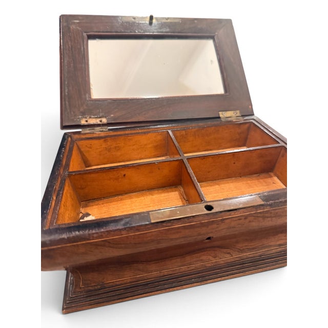 A beautifully crafted French tea caddy acquired during a European buying trip through France, showcasing the timeless...