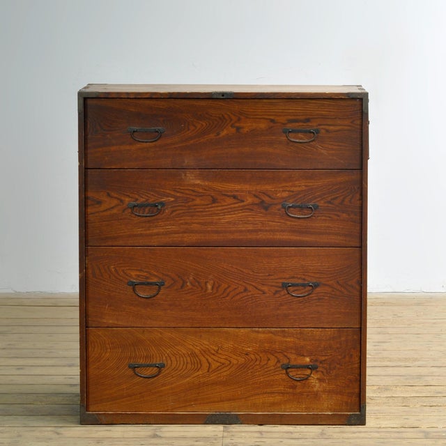 Traditional Japanese Tansu chest of drawers from the 1870s. Manufactured during the late Meiji era (1868-1912). This piece...