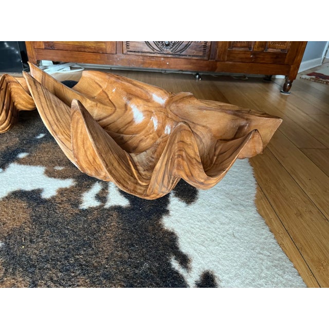 This is a beautiful pair of wooden carved shell bowls. These would look perfect in a beach house as a catchall or just as...
