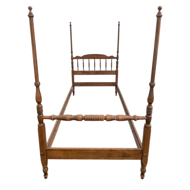 Expertly crafted in the USA from solid maple, this timeless piece features an intricately carved spindle headboard and...