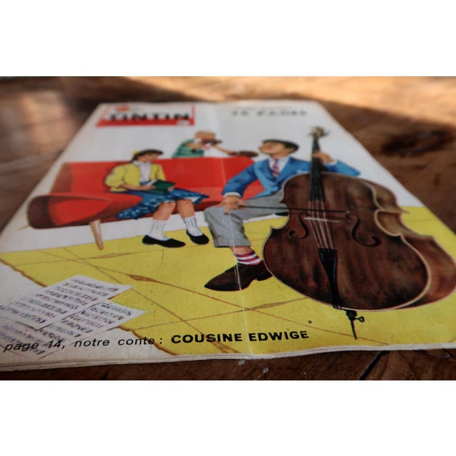 An original issue of Le Journal de Tintin No. 528, dating to December 1958, featuring a refined and colorful illustrated...