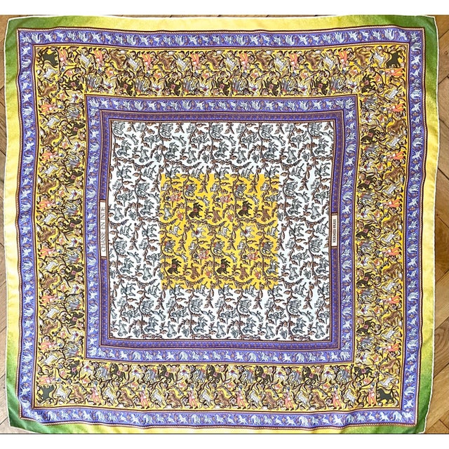 HERMES HUNTING IN INDIA 2008 by Michel Duchene This silk scarf in shades of yellow, green, blue, and white, with subtle...