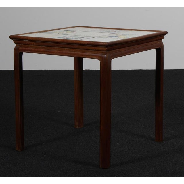 Frits Henningsen sofa table in mahogany with Kähler tiles made by Jens Thirslund. 1930s. This piece is attributed to the...