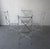 This is a great set of 4 vintage Iron garden chairs with sculptural X-form backs and a beautifully weathered finish. Their...