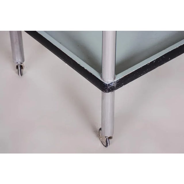 Made by Vichr & Co., a renowned Czech furniture manufacturer. This item features classic Bauhaus design elements. Elements...