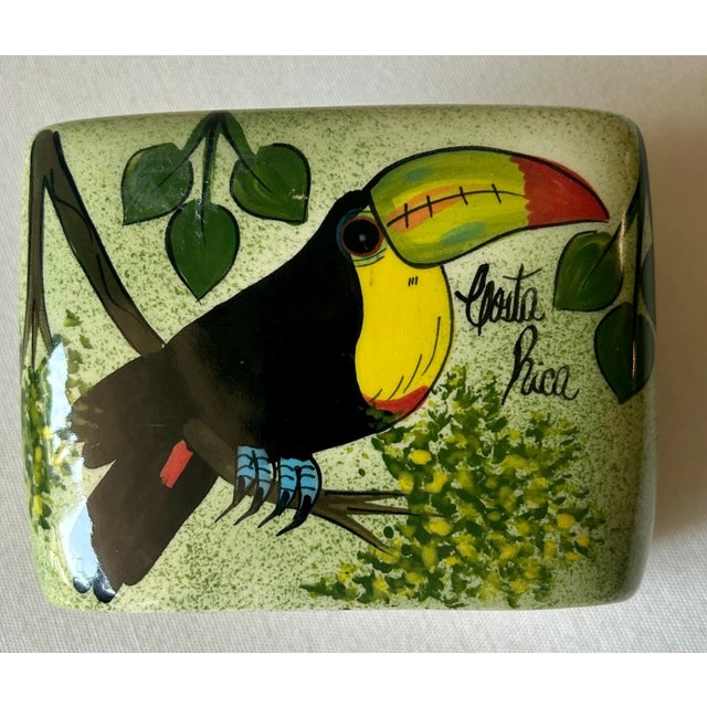 This original work of folk art just happens to be functional as well: a colorful hand painted ceramic napkin holder that...