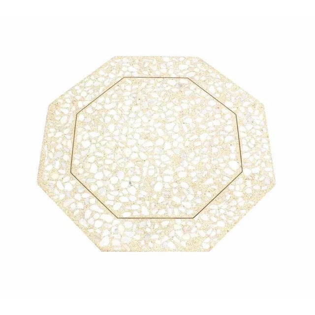 Walnut base octagon terrazzo top coffee table by H. Probber. Nice brass inlay. Made in the early 20th century.