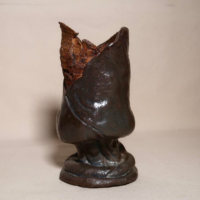 A striking, one-of-a-kind brutalist ceramic vessel with a deeply sculptural presence. Handbuilt with an organic,...