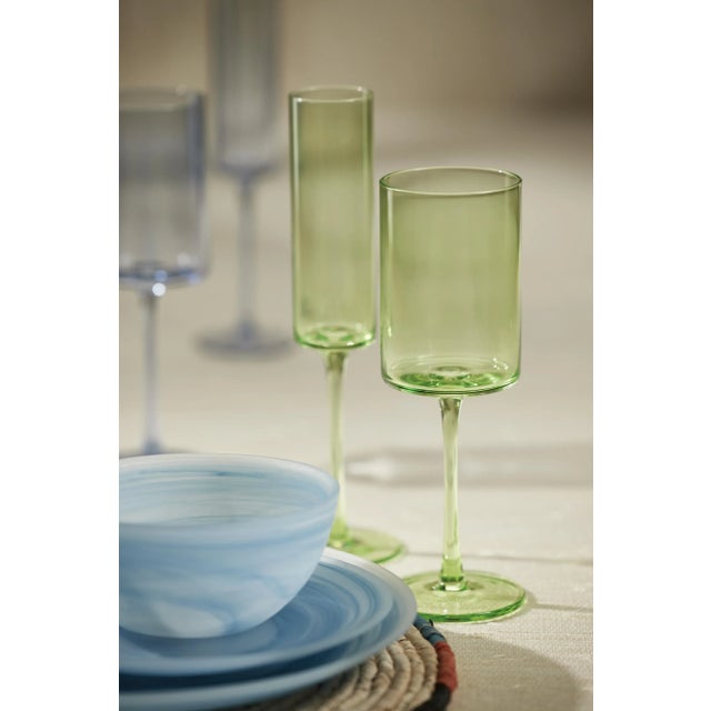 One of the festive and most fun ways to serve champagne is this set of champagne glasses. This unique stemware is an...