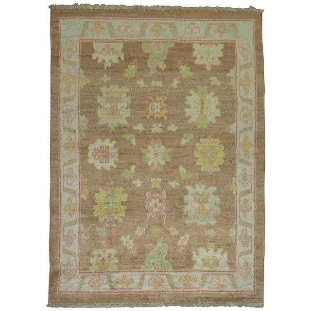 Colorful Oushak made from 100 % hand spun vegetable dyed recycled wool giving it an old world and vintage feel. This piece...