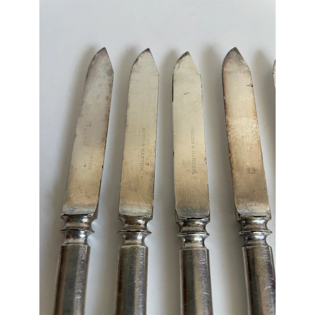 Here is a set of 6 beautiful, silver-plated knives made by Reed & Barton. These have a nice weight to them - they are not...