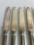 Here is a set of 6 beautiful, silver-plated knives made by Reed & Barton. These have a nice weight to them - they are not...