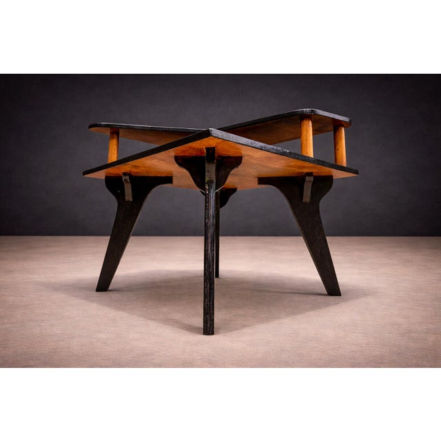 Designed by José Zanine Caldas (1919–2001), Brazil, circa 1950s, this accent or telephone table reflects the designer’s...