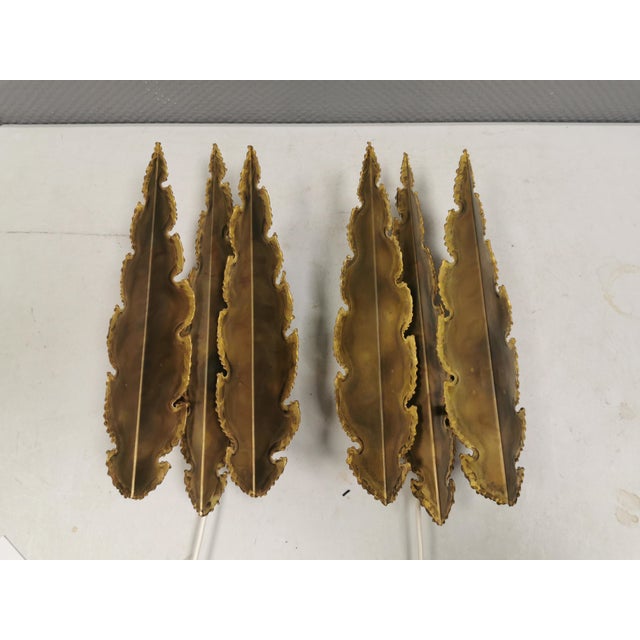 Two fantastic brutalist wall lamps in brass, designed by Svend Aage Holm Sørensen for his own company in the 1960s. Made...