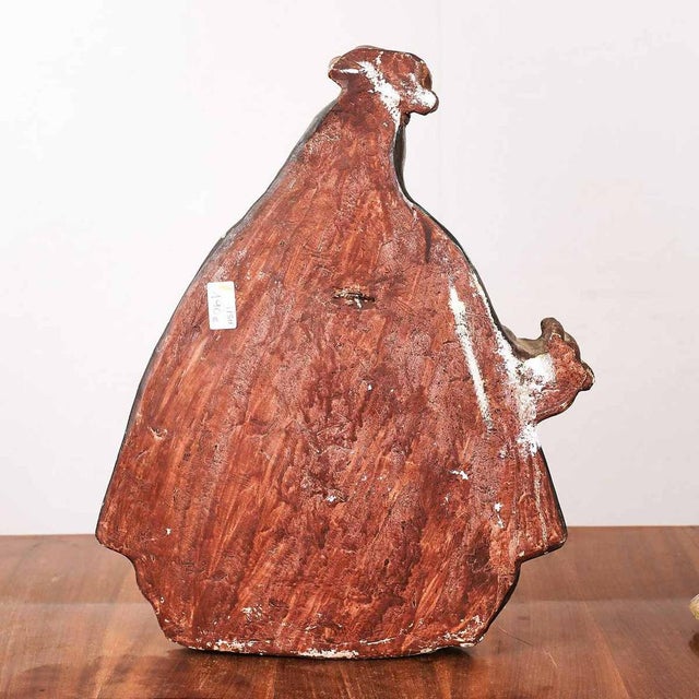 Sculpture glazed in cement paste and Height: 49 Width: 38. This piece is attributed to the mentioned designer/maker. It...