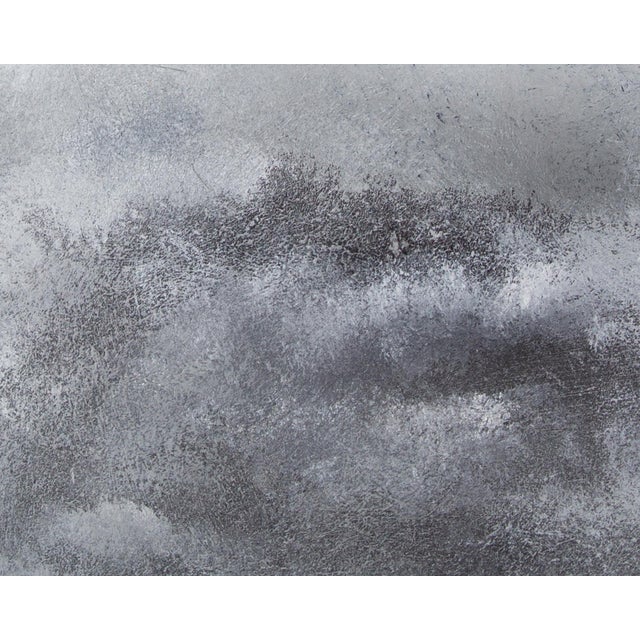 A black, white and grey oil painting by American artist Anthony Louis Popcheff (1954-2000) depicting a sky full of storm...