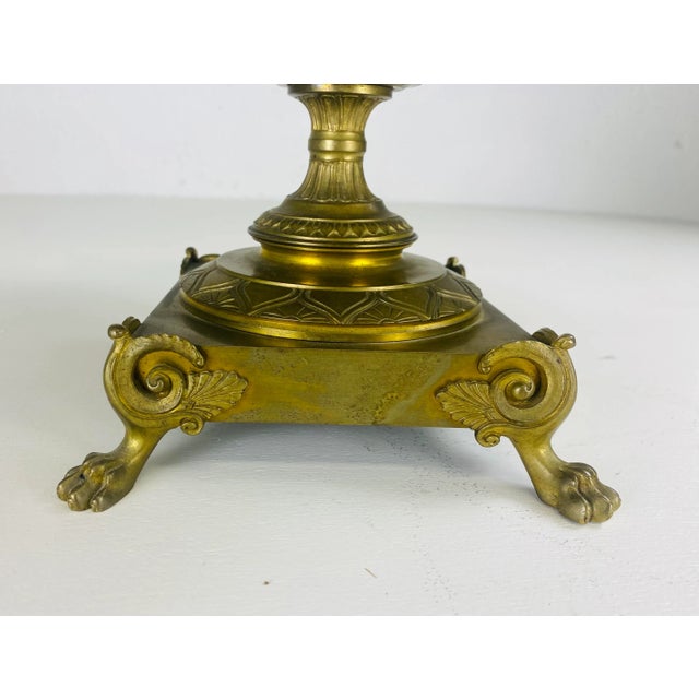This is a late 19th century Italian neoclassical bronze compote. This bronze compote has ornate claw feet and mythical...