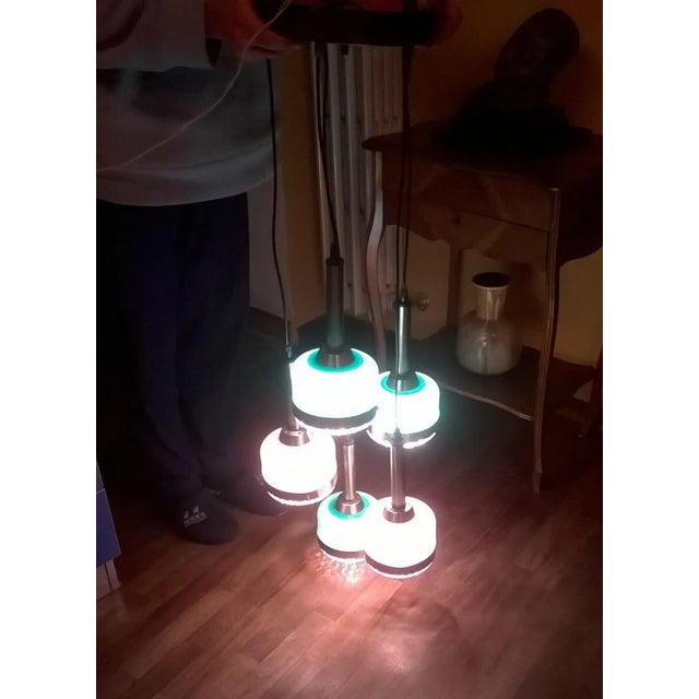 Murano pendant glass made by Vistosi, 1960s. The pendant is made up of 5 lamps in two different colors, n.2 white and n.3...