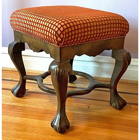Vintage Upholstered Stool with Claw & Ball Feet – Petite Elegance Add a touch of old-world refinement to your home with...