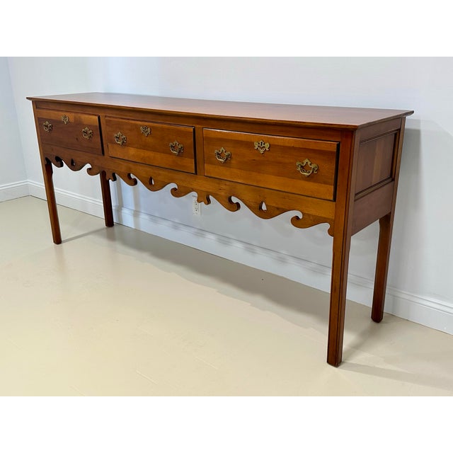 A finely crafted Colonial Revival style huntboard by Wright Table Company, celebrated for its faithful reproductions of...
