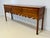 A finely crafted Colonial Revival style huntboard by Wright Table Company, celebrated for its faithful reproductions of...