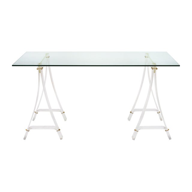 Writing desk from the period mid-century in France. The top is made of glass original to the desk. The top is supported by...