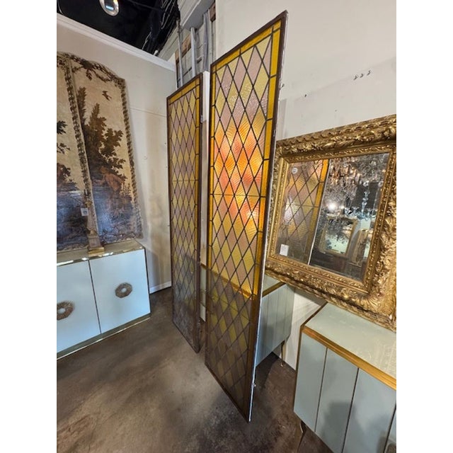 These antique Italian tri-color stained glass windows are a beautiful and unique addition to any home or building. The...