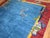 Full pile large Chinese Art Deco rug plum border, blue field Measures: 10' x 19'1".