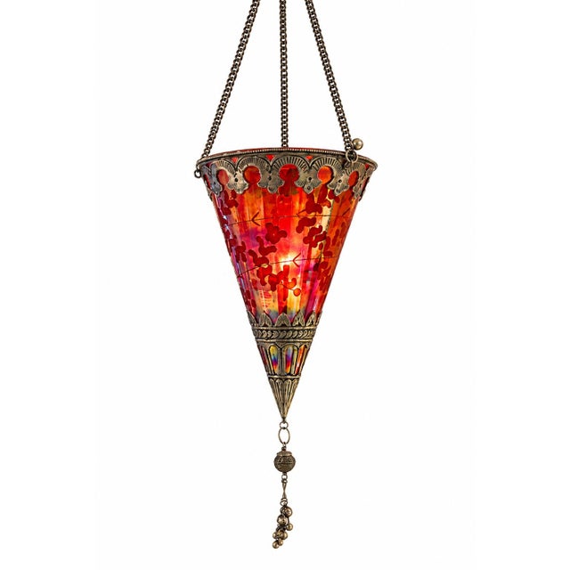 A spectacular vintage Moroccan-style hanging lantern featuring richly colored iridescent glass and ornate metalwork. This...