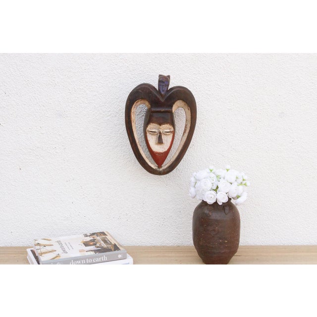 This charming Kwele mask from Gabon or the Republic of Congo is a delightful example of African tribal art. The mask is...