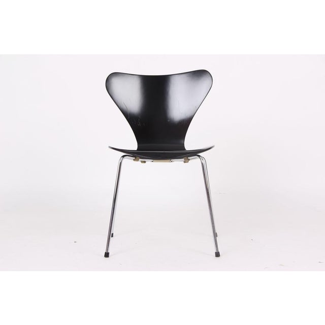Arne Jacobsen designed the Model 3107 in 1955. Eight chairs in black are being sold here. The chairs were manufactured by...