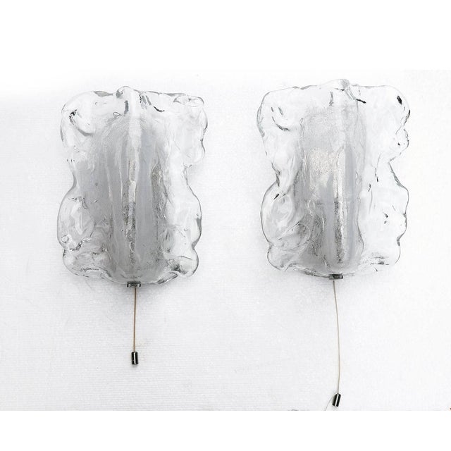 Elegant pair of organic sconces made of clear and white murano glass on a chromed frame by j.t. Kalmar, austria in the...