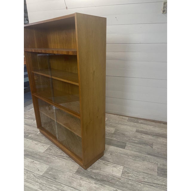 Vintage Bookcase from Interier Praha, 1950, in Flawless conditions. Designed 1950 to 1959 This piece has an attribution...