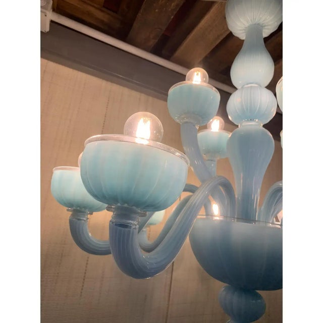 Contemporary murano glass chandelier decorated in matte light-blue colour which makes it extremely modern and luxurious....