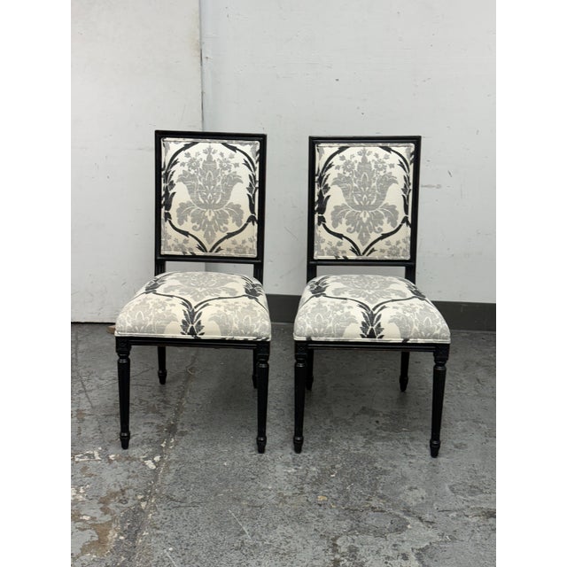 Design Plus Gallery presents a Pair of Louis XVI Side Chairs from Ballard Designs. Inspired by Greek and Roman classicism,...