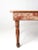 This is an antique farmhouse table. The long harvest table has a baluster style turned legs. Beautiful tone to the wood...