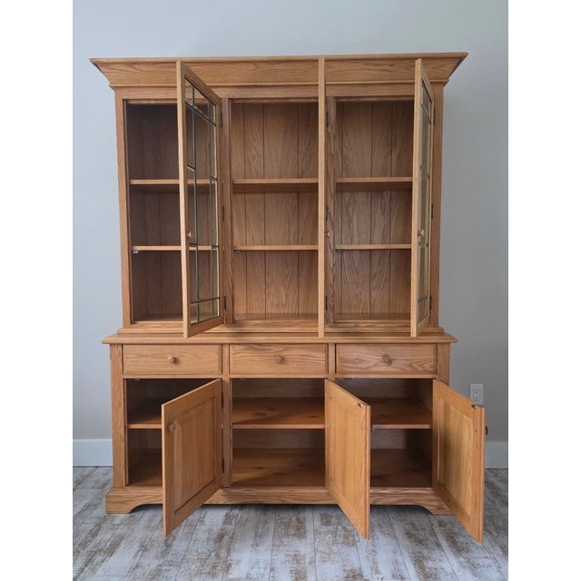 Vintage HUNT COUNTRY FURNITURE two-piece buffet and hutch top in solid oak in their light honey finish. A similar style...