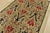 A traditional Ikat rug hand-knotted with fine wool on a cotton foundation. This rug features a botanical design set...