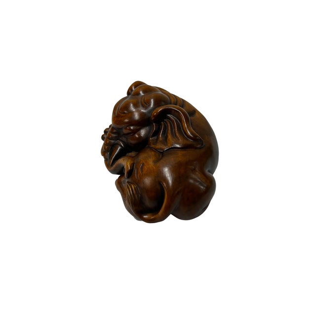 Elevate your collection with this exquisite, hand-carved wooden elephant figurine, measuring 3 inches in length....