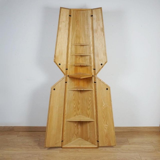 A late 20th century corner drinks cabinet designed in 1980 by jeremy broun. Solid and veneered english ash. Dimensions: h...