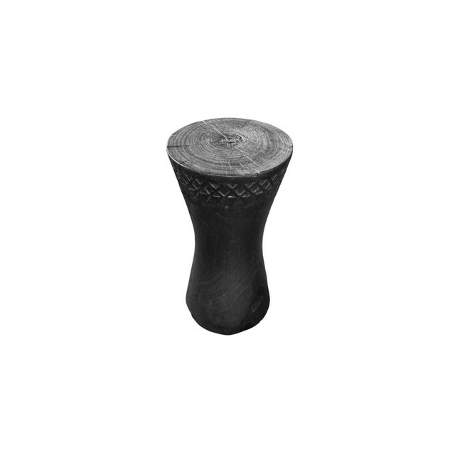 Handcrafted in Bali from solid mango wood, this sculptural side table embodies the balance of organic craftsmanship and...