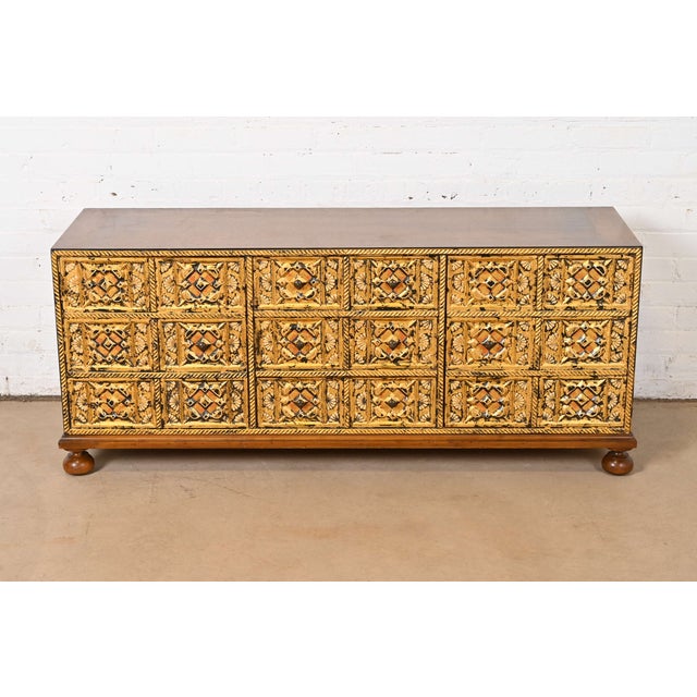 A gorgeous mid-century Mediterranean style low dresser or credenza By John Widdicomb USA, 1960s Walnut case, with...