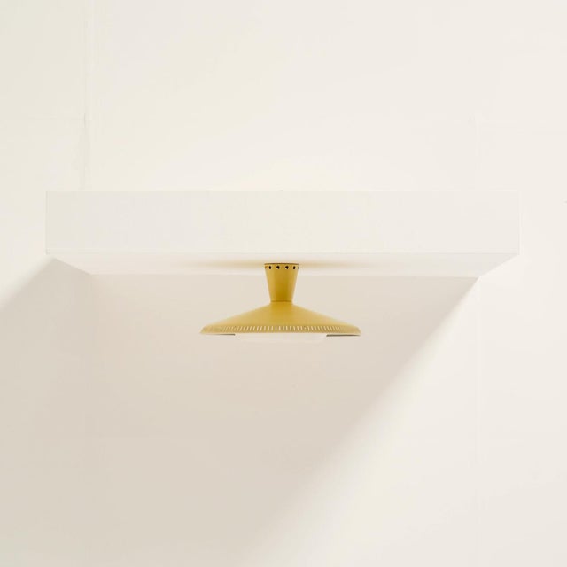This philips nb 93 flush mount quietly brings the spirit of the 1950s into your home. that era’s renewed sense of freedom...