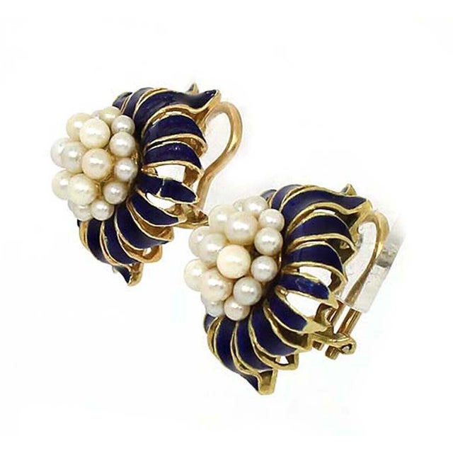 These pearl cluster blue enamel 18k yellow gold clip-on earrings are a beautiful vintage pair that brings together classic...