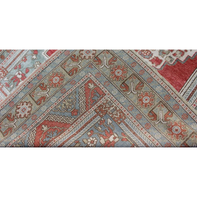 Mid 20th Century Vintage Turkish Oushak Rug With Medallion Design in Coral Pink and Light Blue For Sale - Image 10 of 11