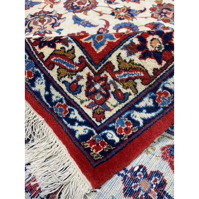 Width: 11 and 12 feet Length: 16 and 17 feet Color: Natural Age: Old Materials: Wool Construction: Hand Knotted